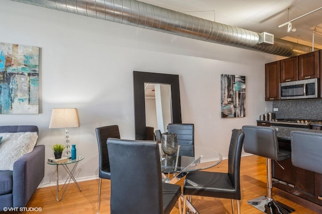 dining area featuring light hardwood / wood-style floors