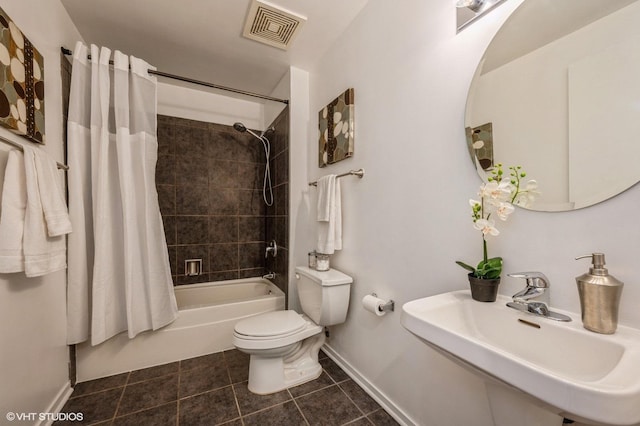 full bathroom with sink, tile patterned flooring, toilet, and shower / bath combination with curtain