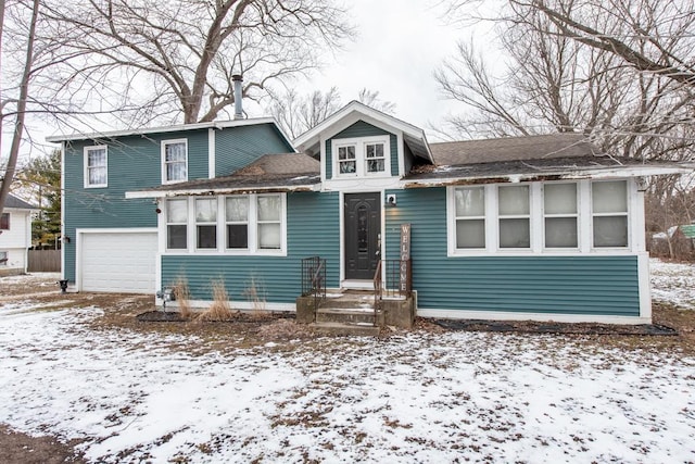 view of front of home with a garage