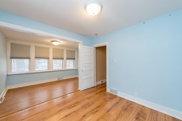 empty room with light wood-type flooring