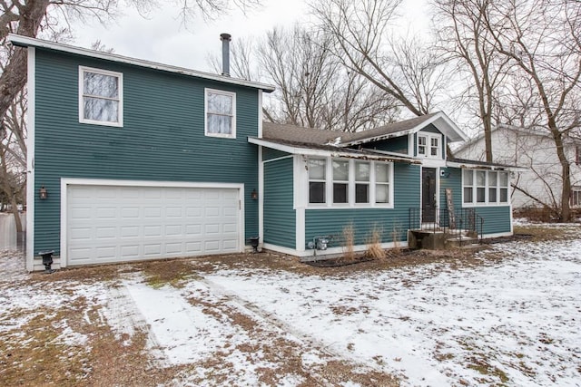 view of front of property featuring a garage