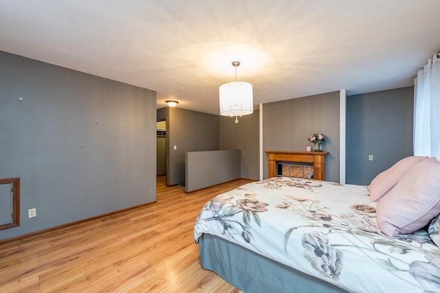 bedroom with light hardwood / wood-style flooring