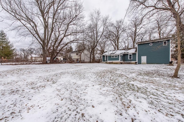 view of yard covered in snow