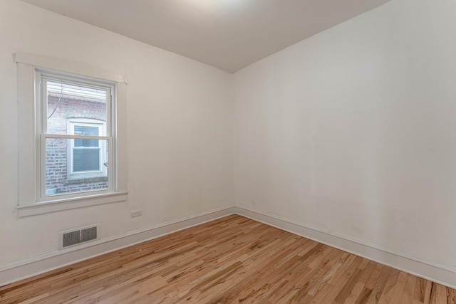 empty room with light wood-type flooring