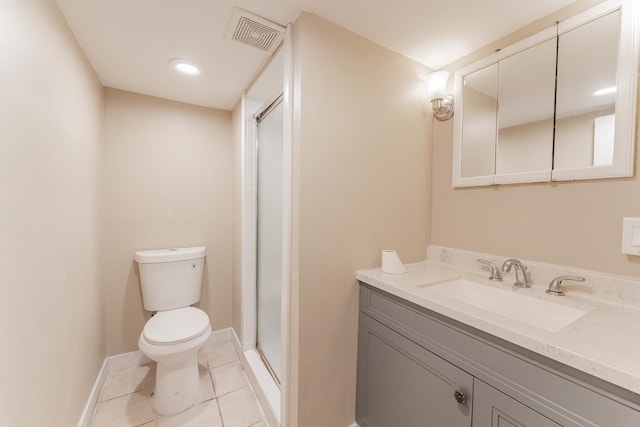 bathroom featuring vanity, an enclosed shower, tile patterned floors, and toilet