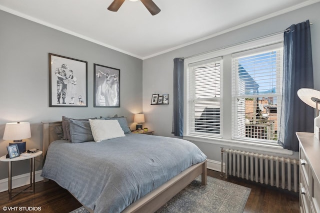 bedroom featuring crown molding, ceiling fan, radiator, and dark hardwood / wood-style floors