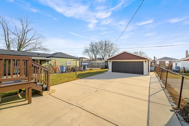 garage featuring a lawn