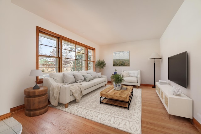 living room with light hardwood / wood-style floors