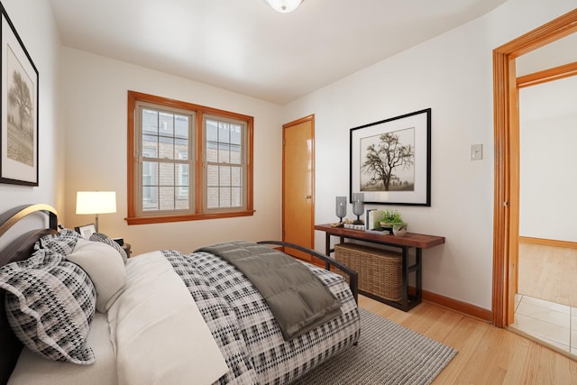 bedroom with light hardwood / wood-style flooring