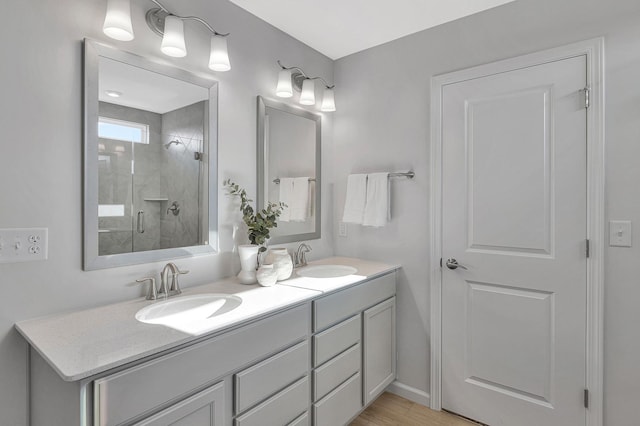 bathroom featuring vanity and walk in shower