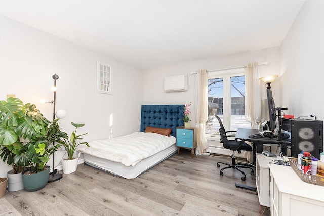 bedroom featuring light hardwood / wood-style flooring