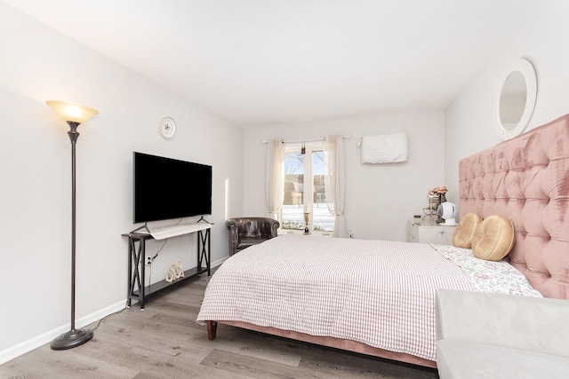 bedroom featuring hardwood / wood-style floors