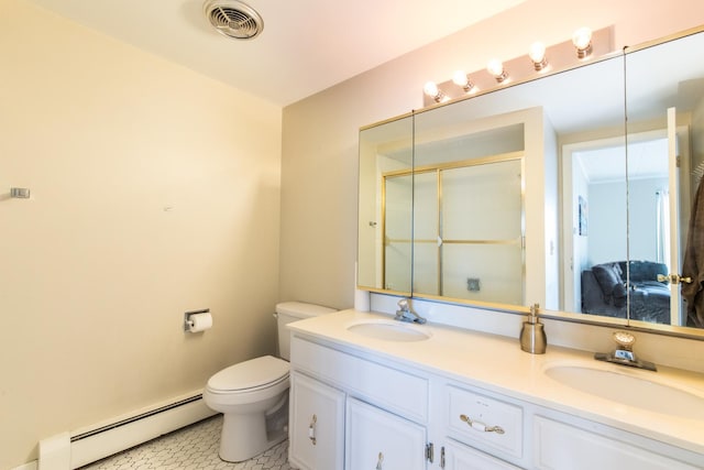 bathroom with toilet, tile patterned floors, a baseboard radiator, a shower with door, and vanity