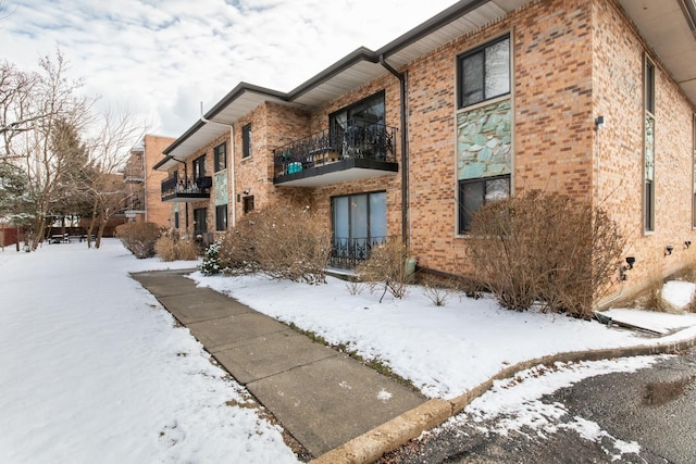 view of snow covered property