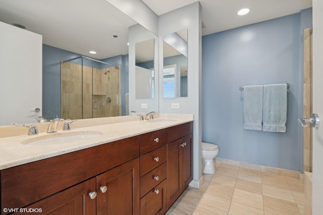 bathroom featuring toilet, walk in shower, tile patterned floors, and vanity