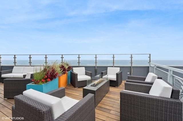 deck featuring an outdoor hangout area and a water view