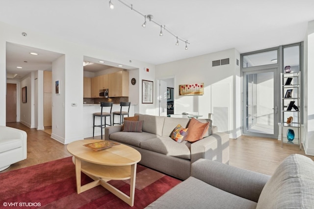 living room featuring light hardwood / wood-style flooring