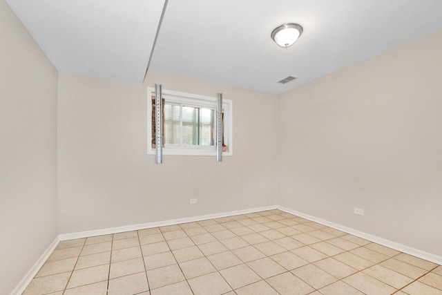 view of tiled spare room