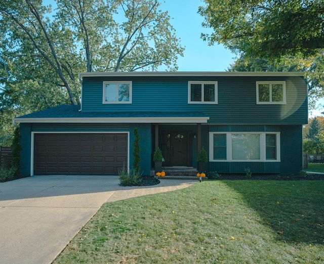 view of property featuring a front lawn