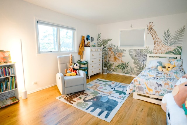 bedroom featuring wood-type flooring