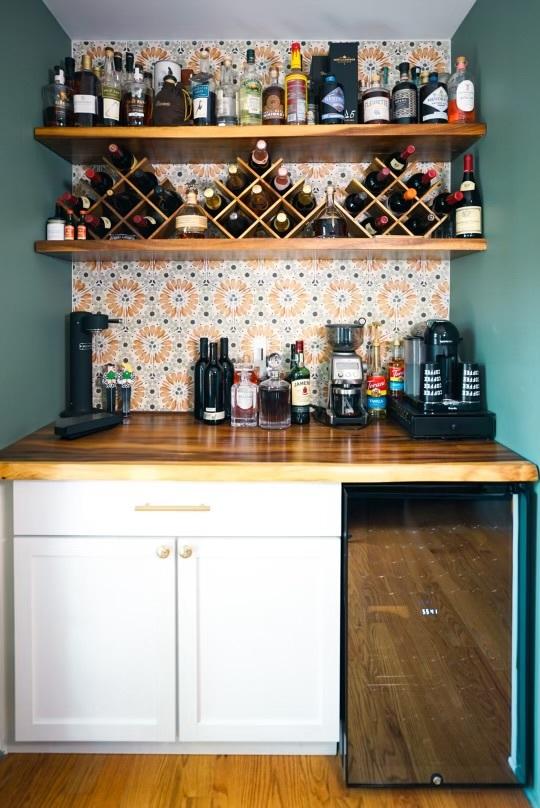 bar featuring white cabinets and beverage cooler