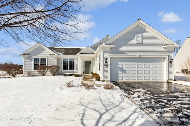 ranch-style home featuring a garage