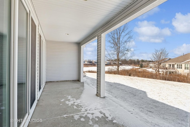 view of snow covered patio