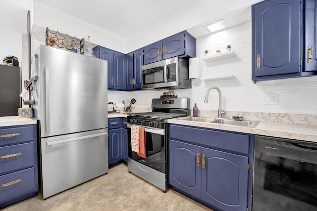 kitchen featuring blue cabinets, appliances with stainless steel finishes, and sink