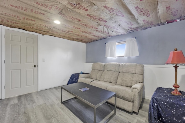 living room with light hardwood / wood-style floors