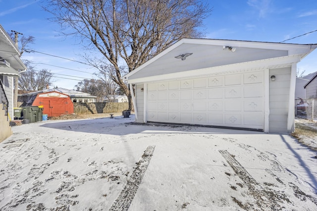 view of snow covered garage