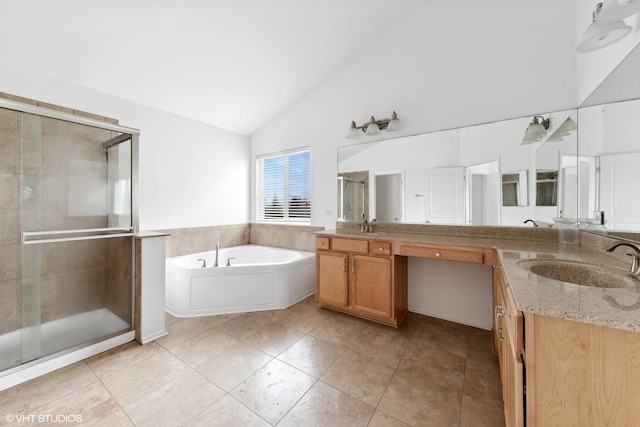 bathroom featuring vaulted ceiling, vanity, and shower with separate bathtub