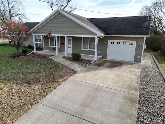 ranch-style house featuring a porch and a garage