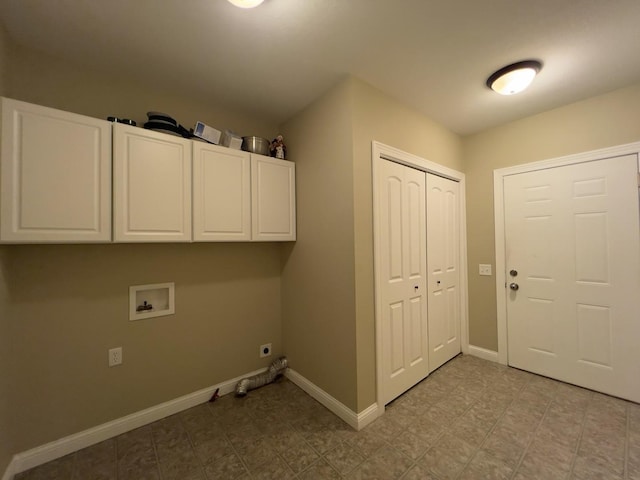 washroom with cabinets, hookup for a washing machine, and electric dryer hookup