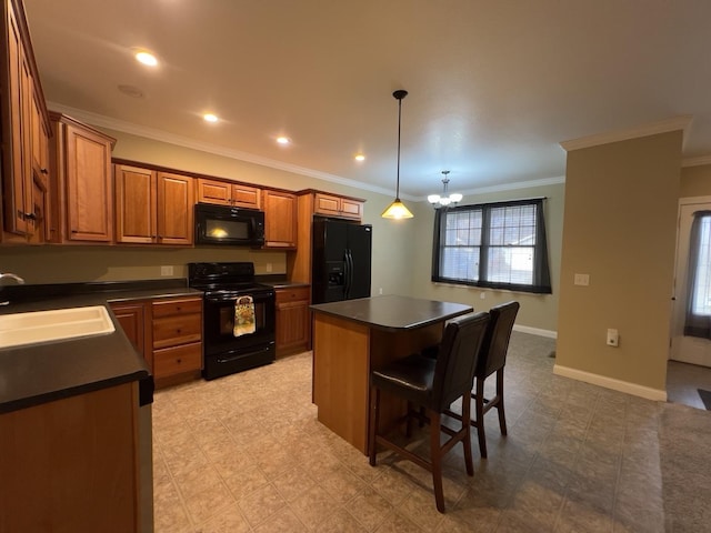 kitchen featuring sink, a center island, an inviting chandelier, hanging light fixtures, and black appliances