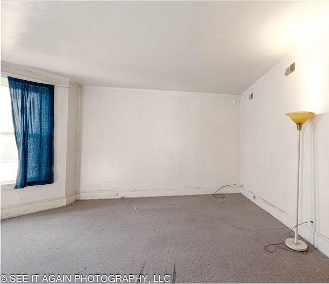 spare room with visible vents