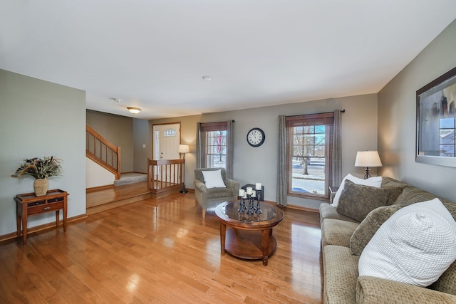 living room with light hardwood / wood-style flooring