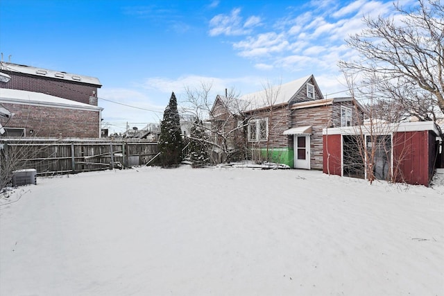 view of yard layered in snow