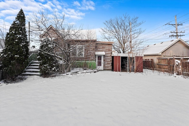 view of yard layered in snow