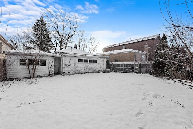 view of snow covered house