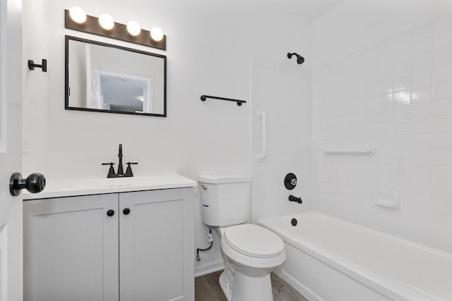 full bathroom with toilet, hardwood / wood-style flooring, shower / tub combination, and vanity