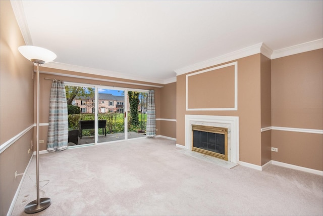 unfurnished living room with a premium fireplace, crown molding, and carpet flooring