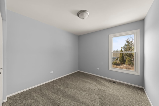 spare room with carpet flooring