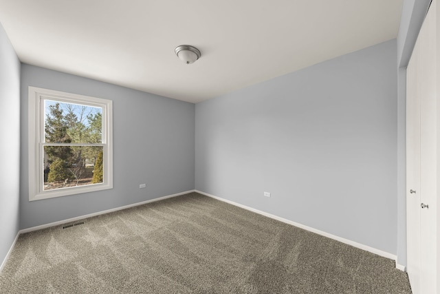 view of carpeted spare room