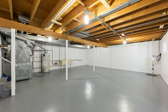 basement featuring heating unit and gas water heater