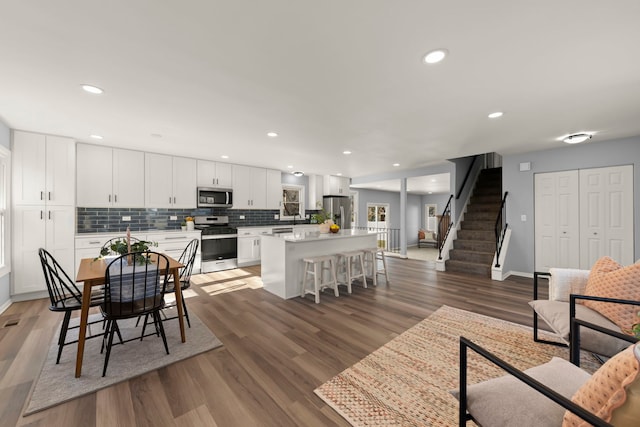 living room featuring dark hardwood / wood-style floors