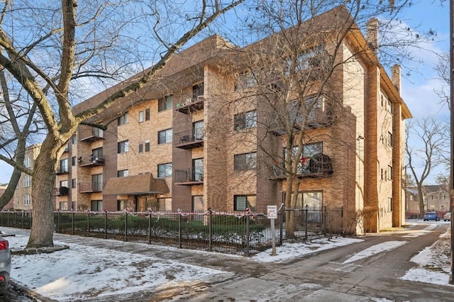 view of snow covered property