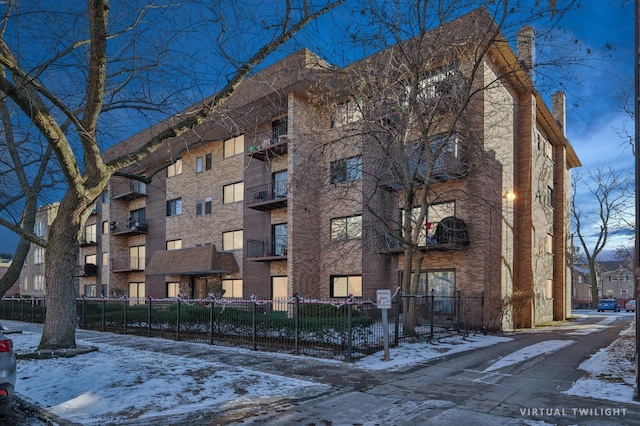 view of snow covered property