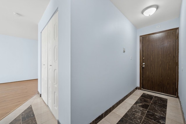 interior space featuring light tile patterned floors