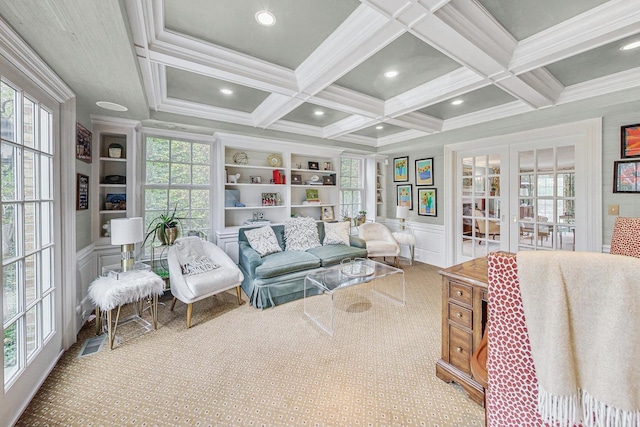 living room with crown molding, french doors, built in features, beam ceiling, and coffered ceiling