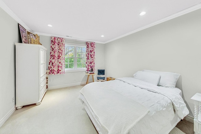 carpeted bedroom featuring ornamental molding